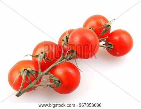 Fresh Organic Cherry Tomatoes Isolated On White Background. The Cherry Tomato Is Regarded As A Botan