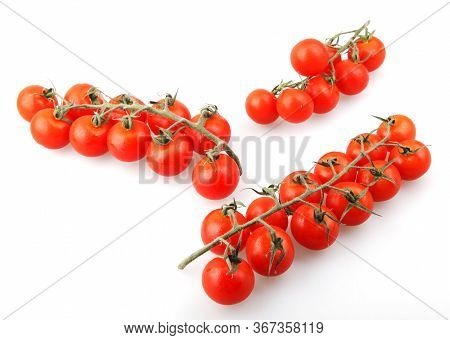 Fresh Organic Cherry Tomatoes Isolated On White Background. The Cherry Tomato Is Regarded As A Botan