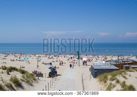 Kijkduin, The Hague, Netherlands - May 21 2020: Ascension Day Holiday Crowds On Dutch Beach During T