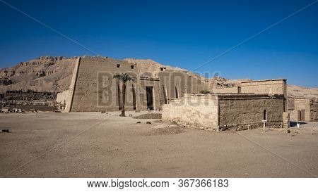 Temple Of Medinet Habu. Egypt, Luxor. The Mortuary Temple Of Ramesses Iii At Medinet Habu Is An Impo
