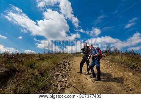 Tourists On Mountain Trekking Poland