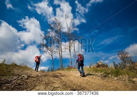 Tourists On Mountain Trekking Poland