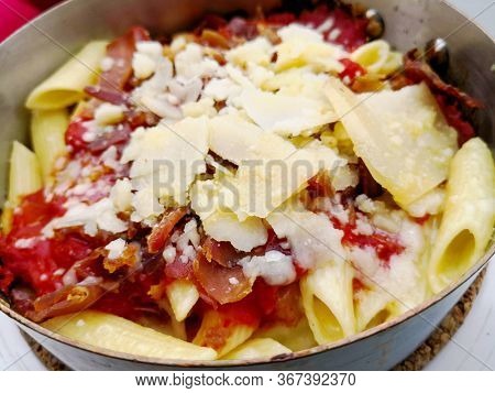 Radiatori pasta in a creamy tomato parmesan cheese sauce