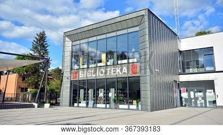 Warsaw, Poland. 21 May 2020. Sign Bibloteka / Library. Company Signboard Biblioteka / Library.