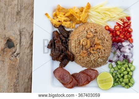 Thai Food - Kao Cluk Ka Pi (mixed Cooked Rice With Shrimp Paste Sauce) On White Round Dish. Fried Ri