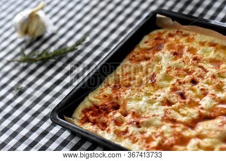 Homemade Italian Focaccia Modenese, With Rosemary And Olive Oil/ Freshly Baked And Ready To Eat/ Aro