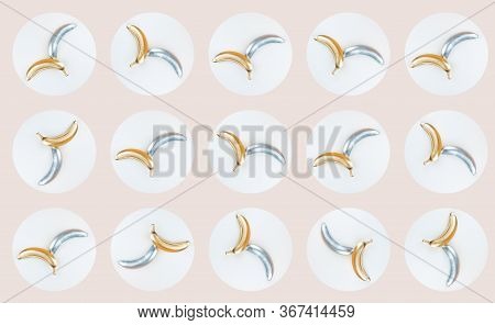 Silver And Golden Colored Bananas On White Circle Background Pattern . Flat Lay Style, Tropic Summer