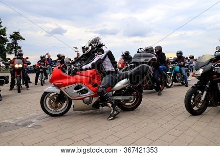 Motorcyclists On Cool Motorbikes, In Helmets And Leather Jackets, Open The Motorcycle Season, Motorc