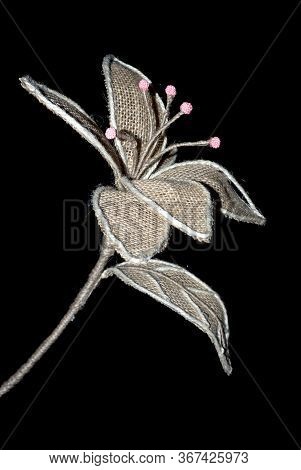Artificial Flower Photographed On A Black Background