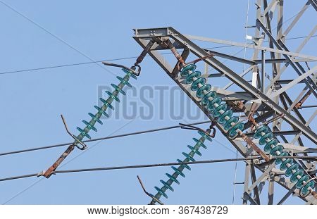 High-voltage Electricity Pylon Against Blue Sky, The Netherlands