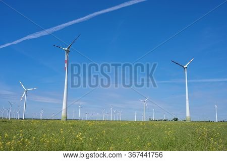 Modern Wind Wheels With A Clear Blue Sky Seen In Germany