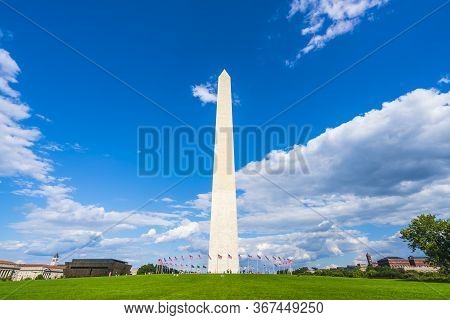 Washington Dc,washington Monument On Sunny Day With Blue Sky Background.