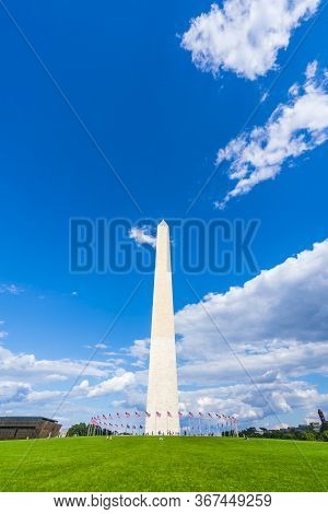 Washington Dc,washington Monument On Sunny Day With Blue Sky Background.