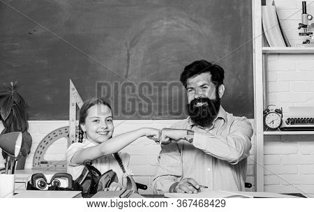 Discipline Upbringing. Man Bearded Pedagogue Study Together With Kid. Study Is Fun. School Teacher A