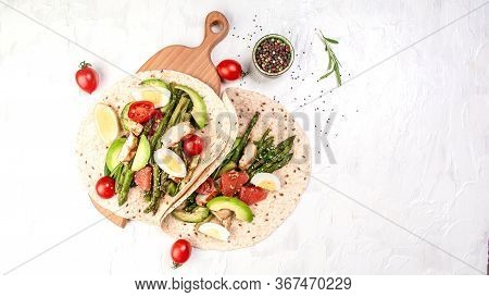 Stack Whole Grain Tortillas. Ingredients For Flatbread Paratha Roti Cherry Tomatoes, Asparagus, On L