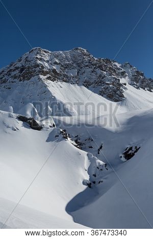 Snowcapped Valbellahorn Mountain Summit Near Arosa In Winter With Snow