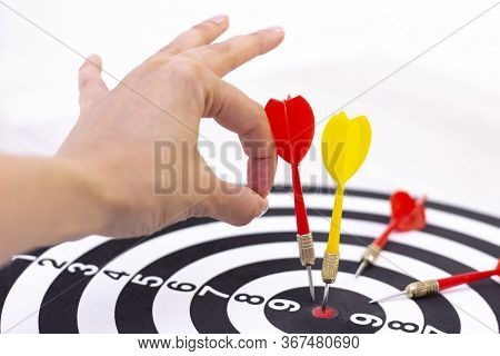Right To Target Concept Using Darts In Bulseye On Darts Business Success Concept. Destruction Of Com