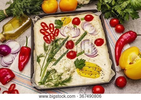 Raw Garden Focaccia. Fresh Dough And Vegetables, Olive Oil, Greens