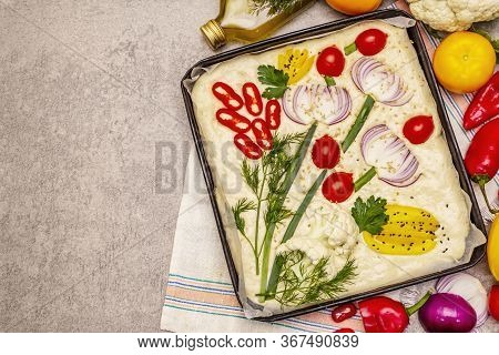 Raw Garden Focaccia. Fresh Dough And Vegetables, Olive Oil, Greens
