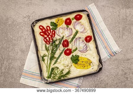 Raw Garden Focaccia. Fresh Dough And Vegetables, Olive Oil, Greens