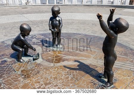 Kiev, Ukraine - July 28, 2018: Children's Monument To The Founders Of Kiev On Poshtova Square. The F