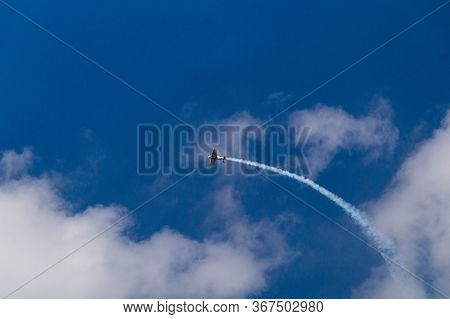 Aerobatics: Performance At A Competition Of A Single-seat Sports Aerobatic Airplane, Which Shows Stu