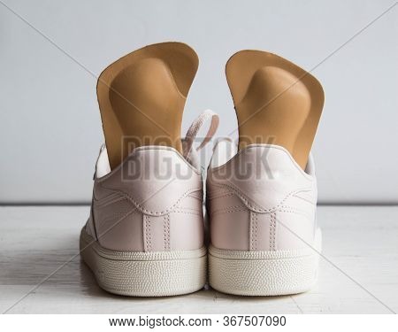 Pink Running Shoes With Orthopedic Insoles. White Background.