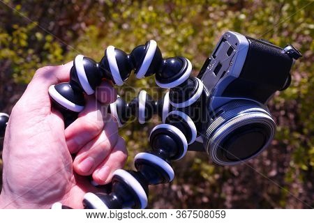 Flexible Tripod For The Camera. Details And Close-up
