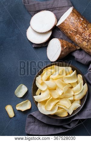 Brazilian Cuisine Food, Latin Snack. Yucca, Yuca, Cassava, Manioca Chips On A Table. Top View Flat L