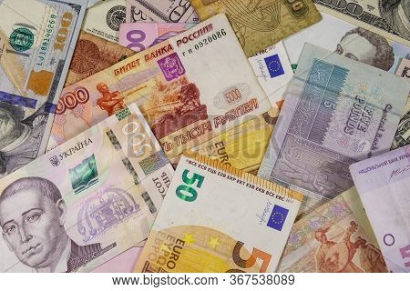 Multicurrency Background Of Euros Us Dollars, Russian Rubles, Egyptian Pounds And Ukrainian Hryvnias