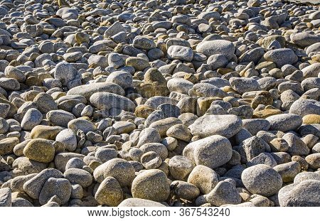 Harmonic Background At Pebbel Beach With Stones Formed By The Ocean, Usa
