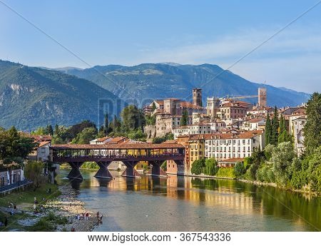 Old Bridge In Bassano Del Grappa In Italy With River Brenta
