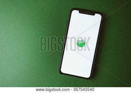 Russian Bank Sberbank, Iphone With Screen Of Sberbank Online App. Copy Space.