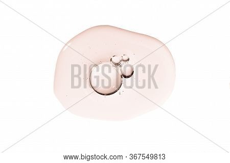 Serum Smear Smudge Golden Swatch With Collagen And Peptides. Skin Care Gel Transparent Sample Golden