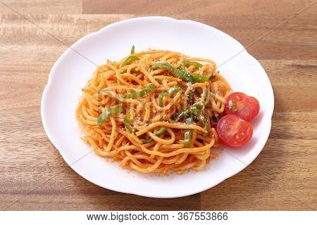Japanese Naporitan Spaghetti With Tomato Sauce In A Dish On Table