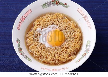 Japanese Instant Chikin Noodles In A Bowl On Table, Top View