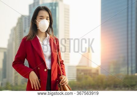 Asian Girl Use A Protection Mask For Prevent Pm 2.5 And Corona Viruus Or Covic 19 In Bangkok City