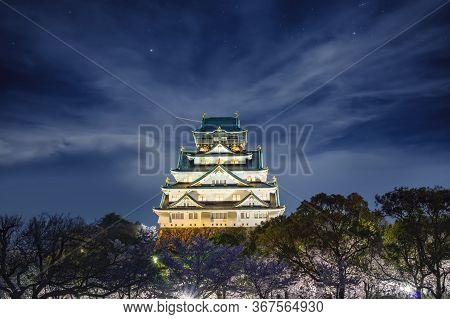Himeji Castle In Osaka With Full Bloom Of Sakura In Japan At Night, This Immage Can Use For Travel C