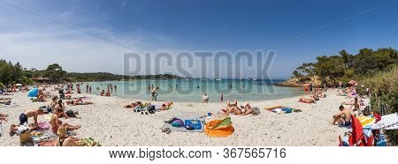 Porquerolles, France - June 10, 2019 : People On The Silver Beach (plage D'argent) In Porquerolles, 