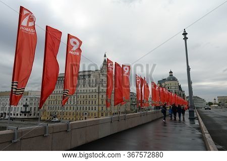 Moscow, Russia - May 9, 2020:red Flags On A Holiday On The Bolshoi Moskvoretsky Bridge In Moscow