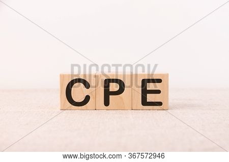 Word Cpe Business Acronym Cost Per Engagement Is Made Of Wooden Building Blocks. Concept.