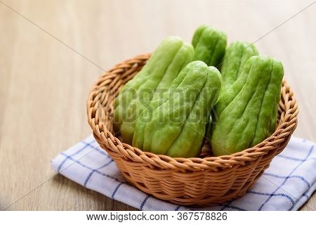 Chayote Squash Or Mirlition Squash In Basket, Organic Vegetable