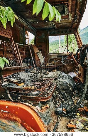 Old Abandoned Rusty Wrecked Kamaz Car. Kamaz In A Landfill.