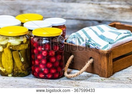 Jars With Variety Of Canned Vegetables And Fruits, Jars With Zacusca. Preserved Food Concept In A Ru