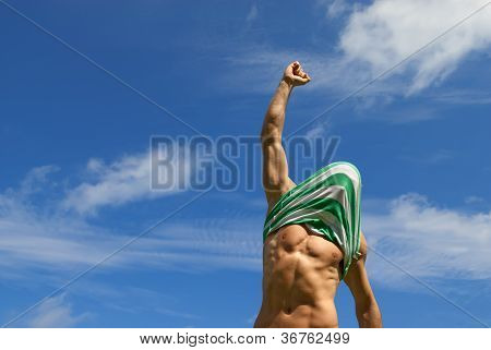 Happy Winner With Shirt On His Head