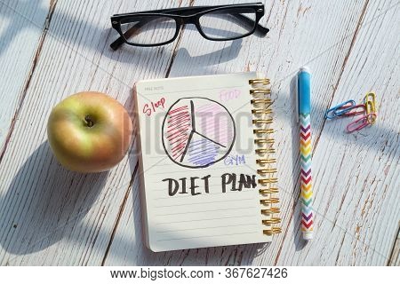 Diet Plan, Menu Or Program, Apple And Donuts On Table