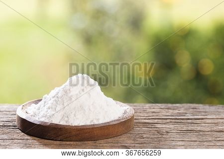 Baking Soda, Sodium Bicarbonate. Wooden Table In The Park Among The Trees On A Summer Day.