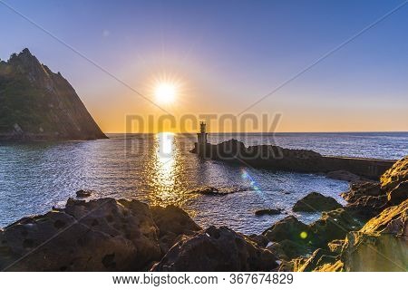 The Lighthouse With Beautiful Light In The Town Of Pasajes San Juan. Gipuzkoa, Basque Country. Verti