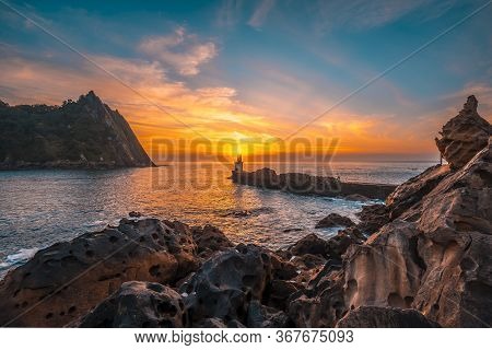 Landscape At The Lighthouse At Sunset In Pasajes San Juan Near San Sebastian, Guipuzcoa. Basque Coun