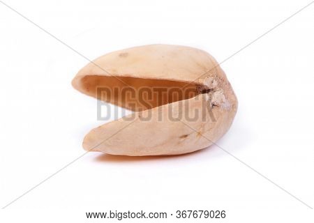 Single empty pistachio shell isolated on white background